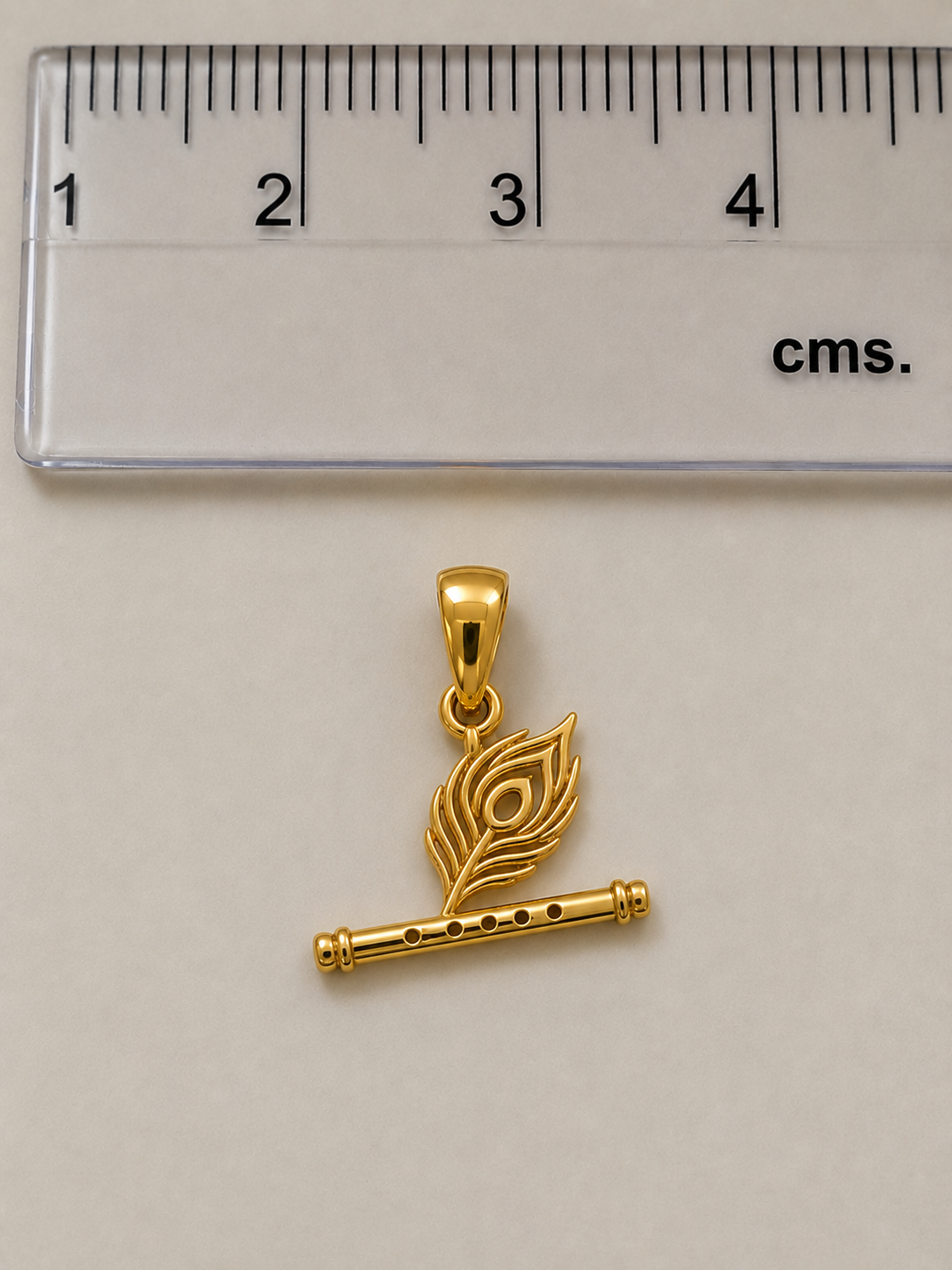 Feather & Flute Rakhi cum Pendant