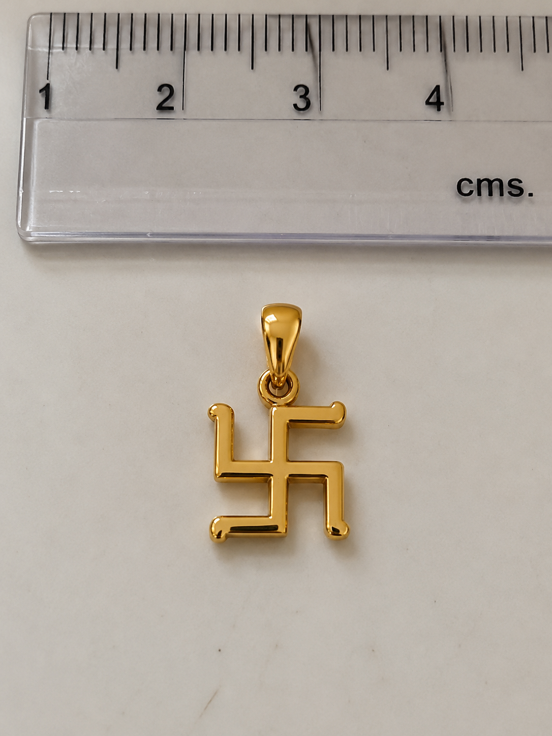 Swastik Rakhi cum Pendant